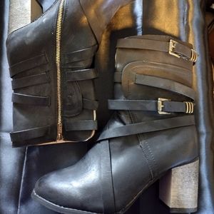 Strapy calf high boots